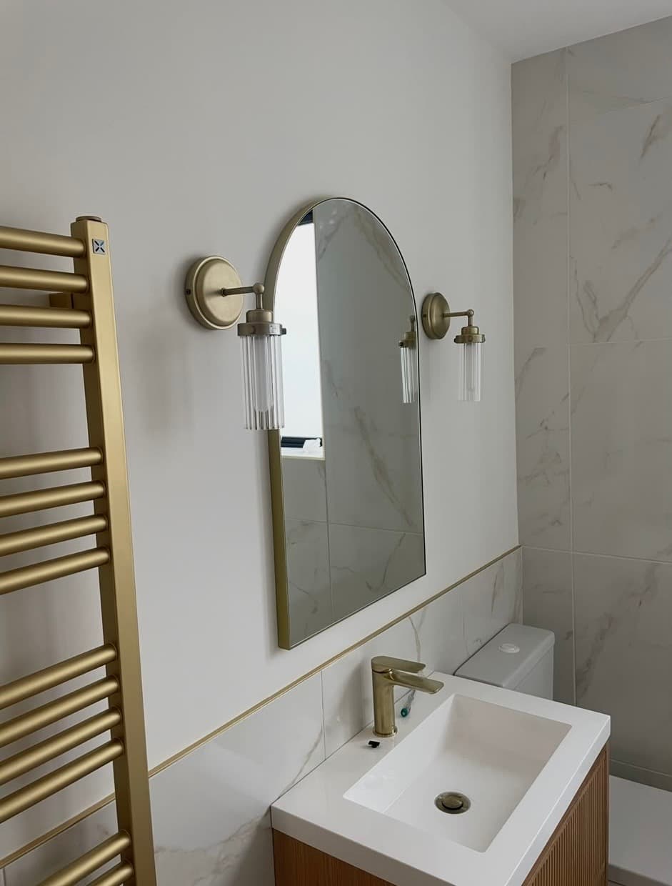 Walk-in shower with grey metro tiles and chrome thermostatic fittings